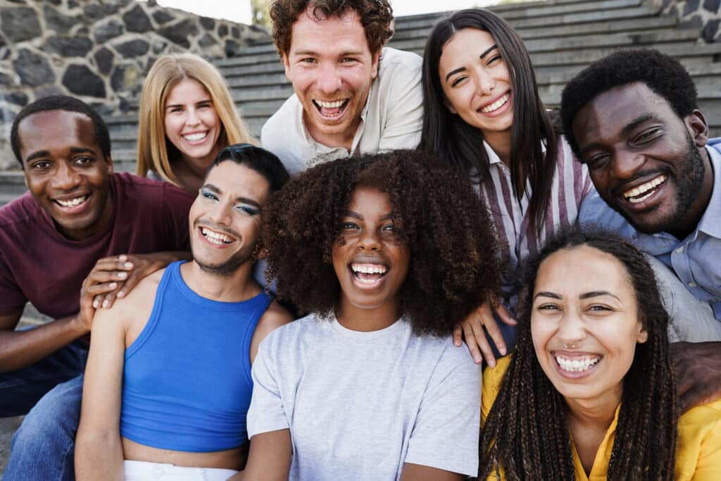 trans people smiling together