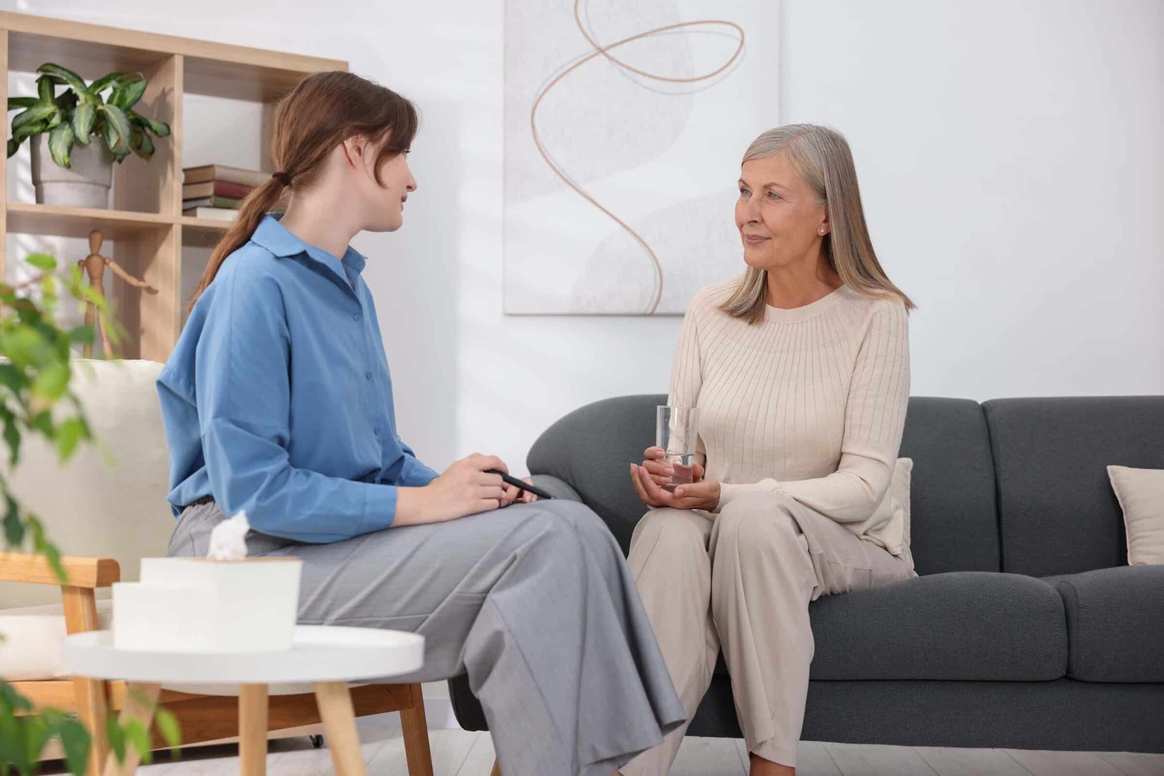 Professional psychotherapist working with patient in office